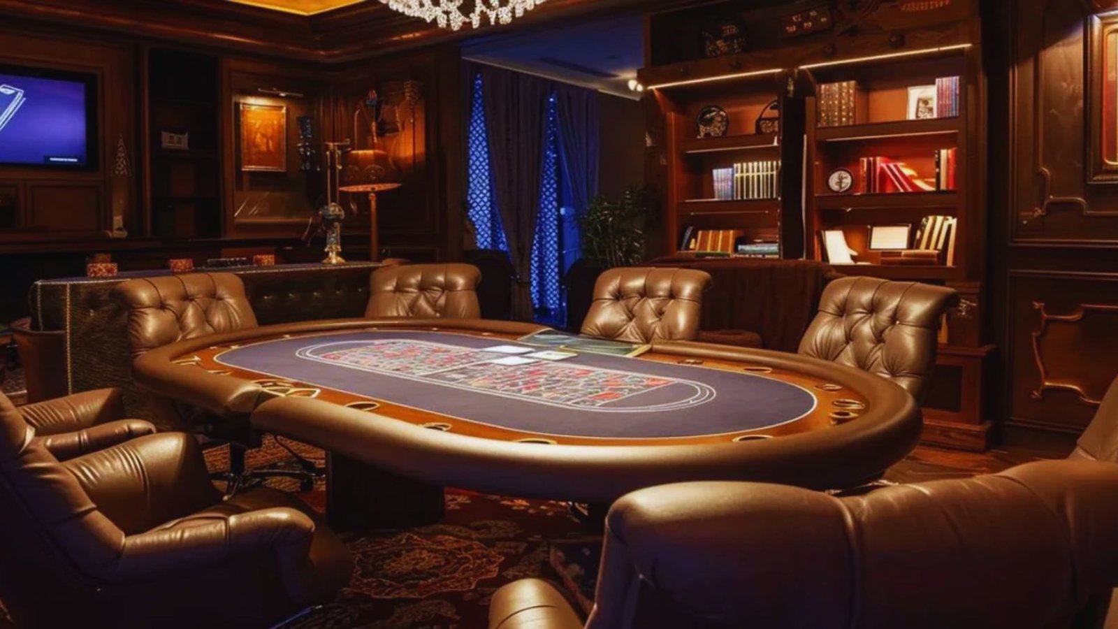 Luxurious poker room with a large round table, leather chairs, wooden shelves filled with books, warm lighting, and an elegant chandelier.