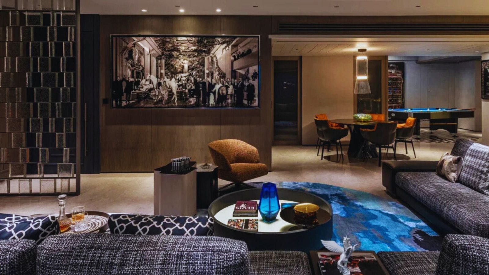 A modern living room featuring sleek furniture and contemporary decor elements.