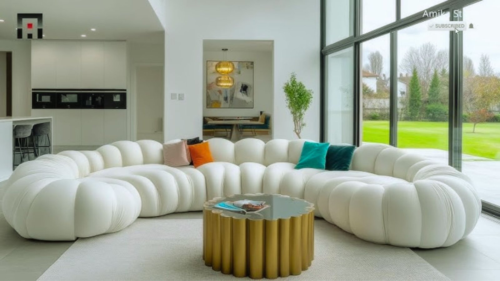 A modern living room featuring a spacious white couch as the focal point of the stylish interior design.