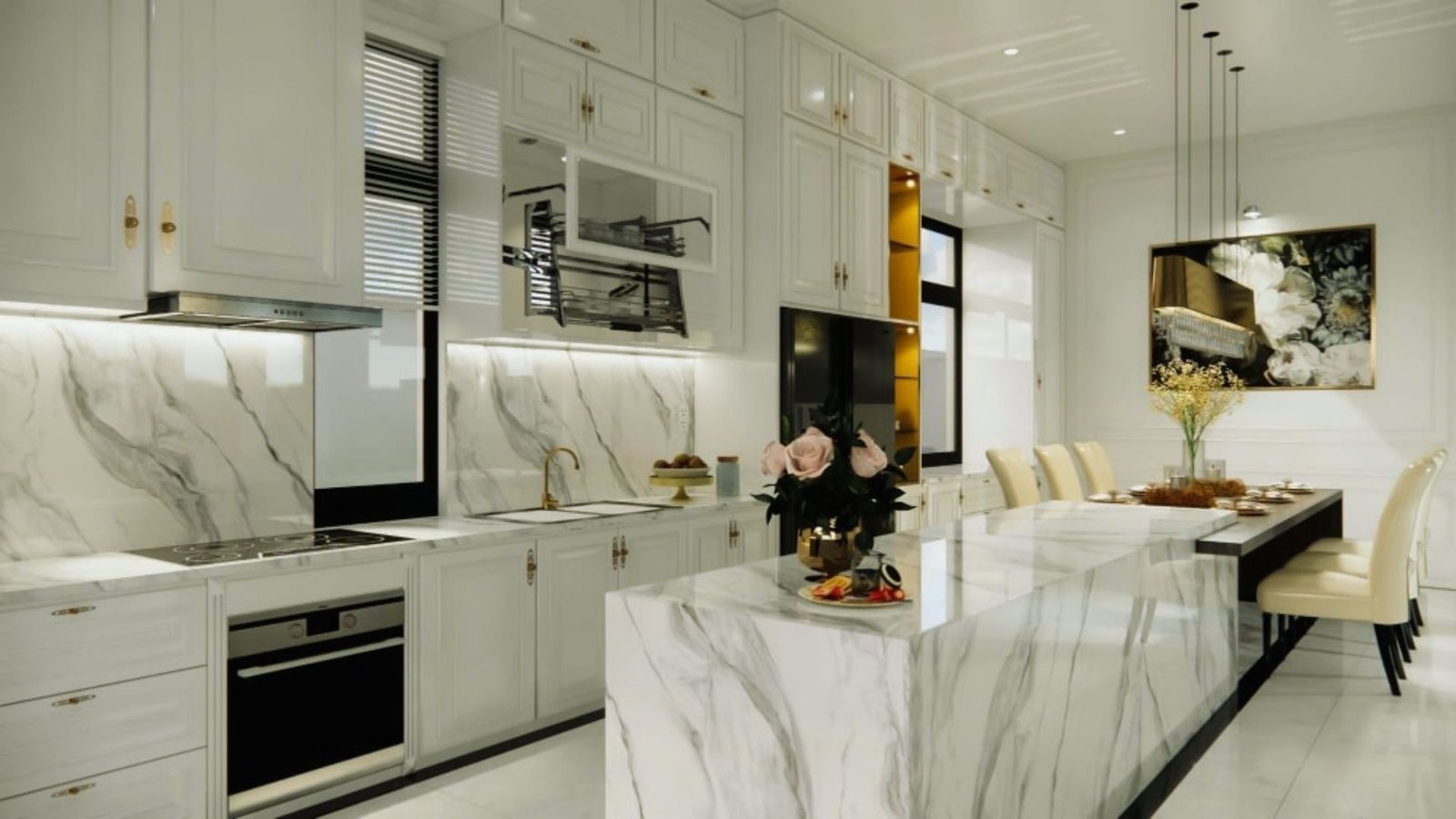 A modern kitchen featuring elegant marble countertops and sleek white cabinets.