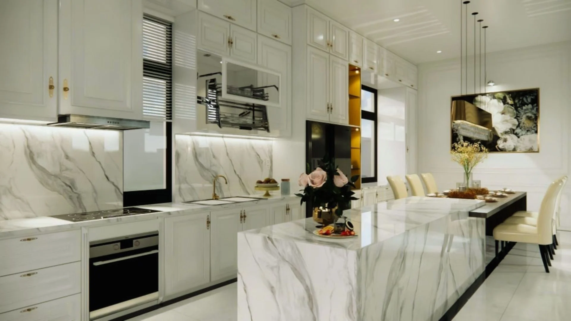 A modern kitchen featuring elegant marble countertops and sleek white cabinets.