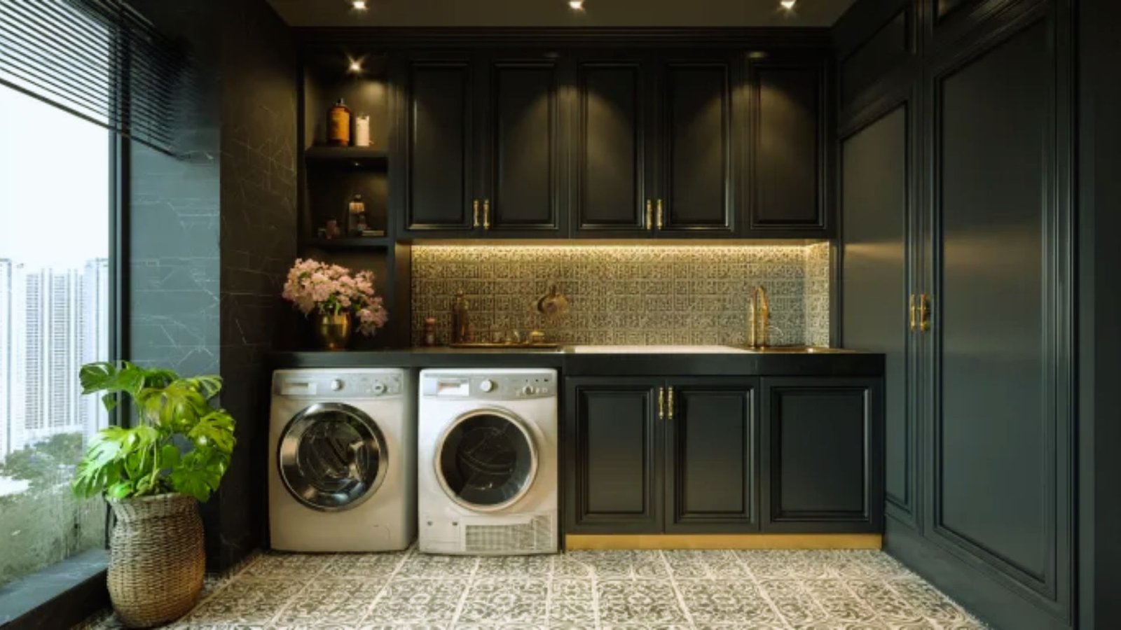 A laundry room featuring a washer and dryer, with shelves and laundry supplies visible in the background.