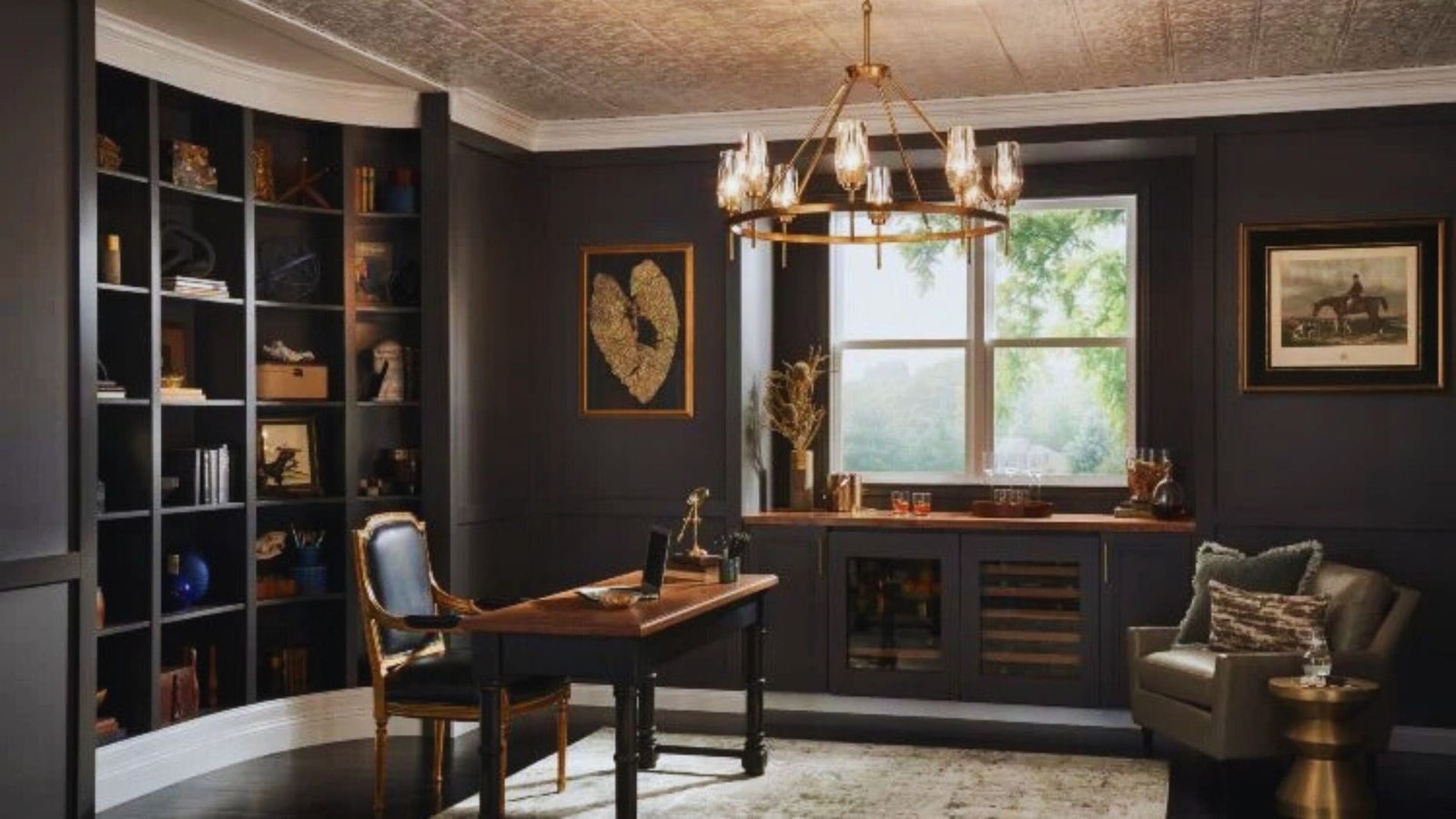A home office featuring a desk, chair, and bookshelves filled with books and decorative items.