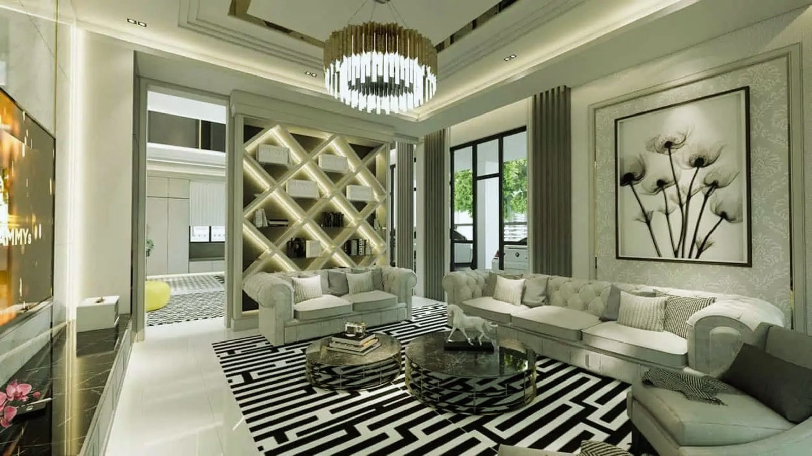 . A bright living room with a black and white rug, complementing the furniture and creating a chic atmosphere.